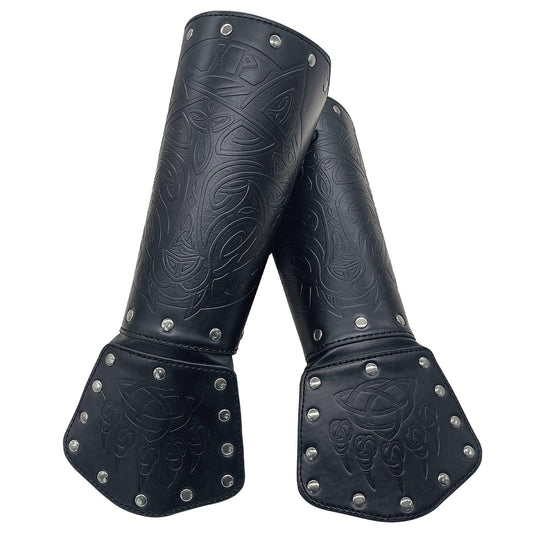 Black medieval bracers with Celtic embossed patterns and metal rivet accents, cosplay armor