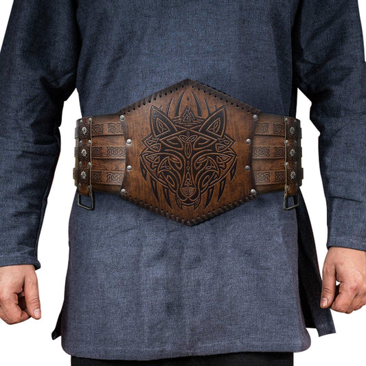 Medieval leather belt with embossed wolf design, worn over a blue tunic, Viking cosplay accessory