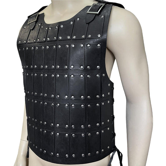 Black medieval leather lamellar armor vest with metal rivets on mannequin