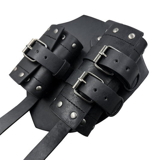 Black medieval leather bracers with metal buckles and rivets for cosplay or costume armor